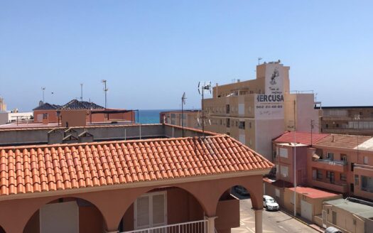 Seaside Living: One-Bedroom Apartment with Garage, 50m from the Beach